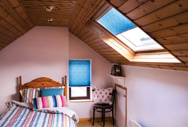 Pleated blinds in an attic bedroom. - Blinds Norfolk - Norwich Sunblinds